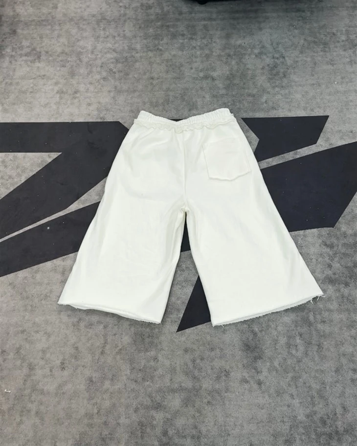 Wholesale OEM Cotton Shorts Light White Ruffled Culottes Elastic Waist Wide Leg Kornit DTG Print suppliers Wholesale OEM Cotton Shorts Light White Ruffled Culottes Elastic Waist Wide Leg Kornit DTG Print suppliers